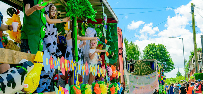 Decorated lorry for Chesham carnival with flowers, summers day