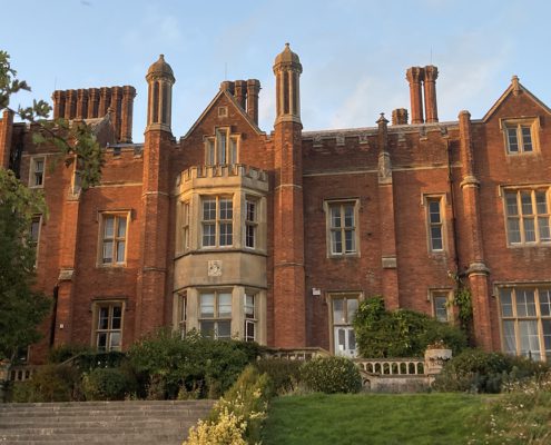 Latimer House viewed from below in late afternoon sunshine
