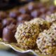 Close up of chocolate truffles costed in hazelnuts