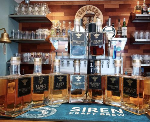 Display of craft mead drinks on counter, in interior of Trekkers bar