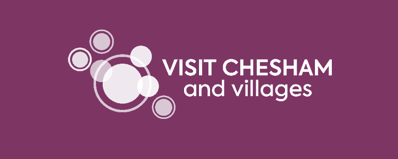 Visit Chesham and Villages white logo on plum background -the official, funded not-for-profit-tourism website for Chesham