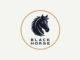 graphic logo of black horse head in a gold outlined circle