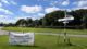 Cholesbury common with banner for summer fete, August Bank Holiday Monday