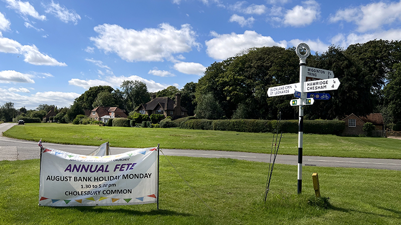 Cholesbury common with banner for summer fete, August Bank Holiday Monday