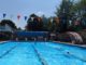 Chesham Open Air Pool on a summer's day, with some lane swimmers