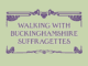 WAlking with Suffragettes wordking in Art Nouveau style text in suffragette purple