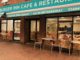 Exterior of Burger Inn cafe and restaurant with some outdoor seating