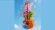 A cello floating in the sky decorated with flora and foliage symoblising each of the four seasons