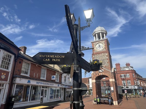 clock tower and signposts market square