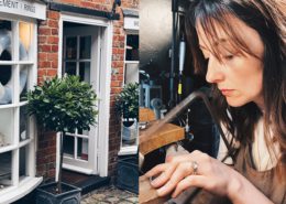 front of shop with white bay windows with bay tree in pot next to front door, next to an image of louise the jeweller at work.jpg