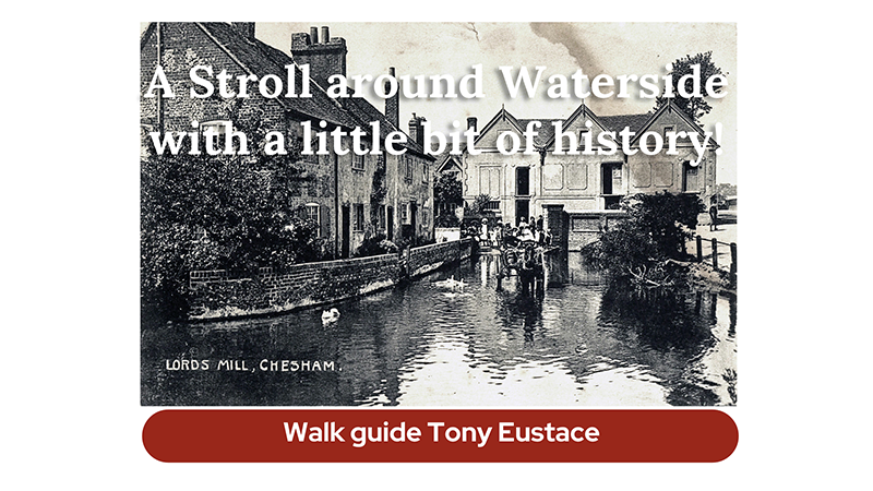Old black and white photograph of one of the water mills in Waterside by open stretch of river